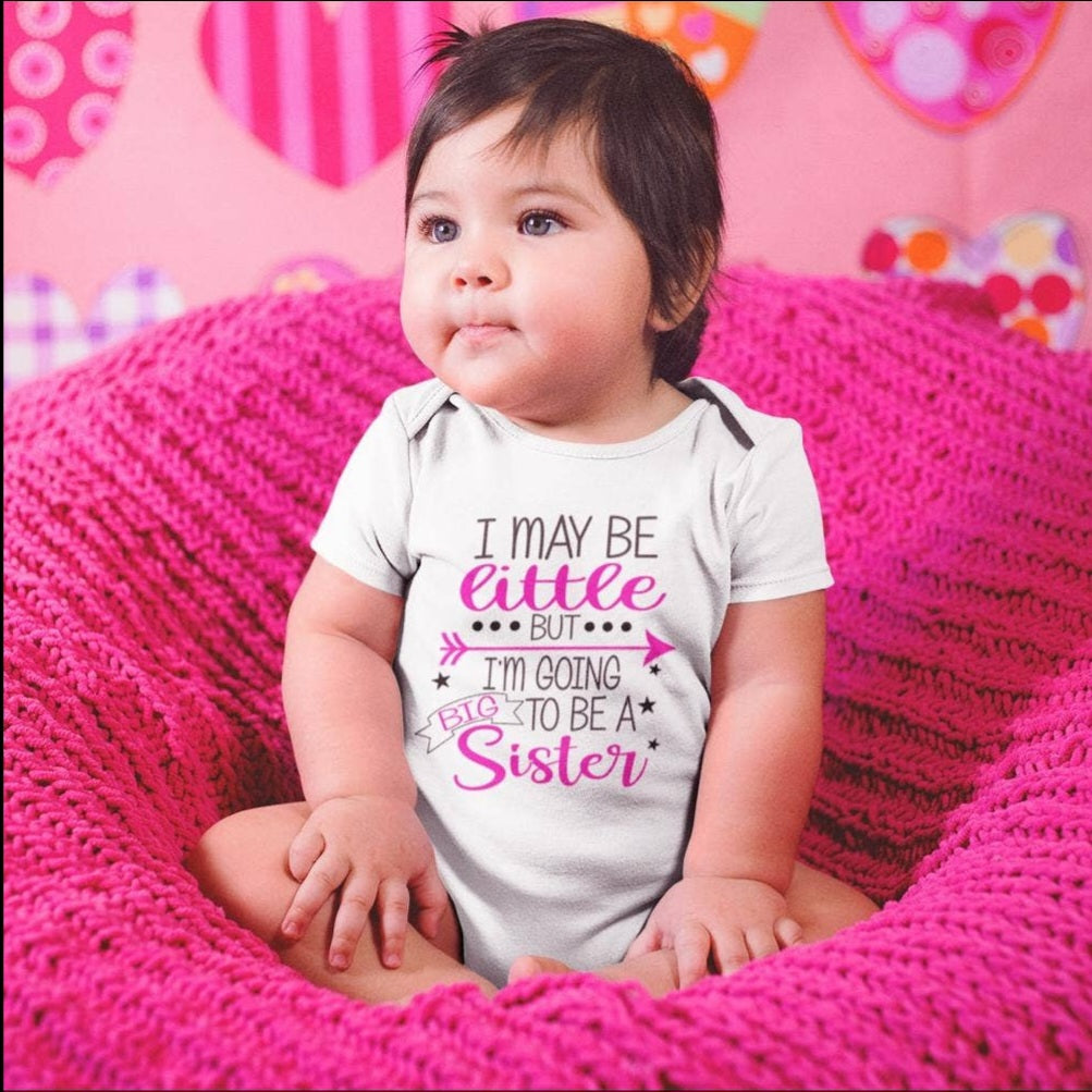 "I may be little but I'm going to be a big sister" onesie